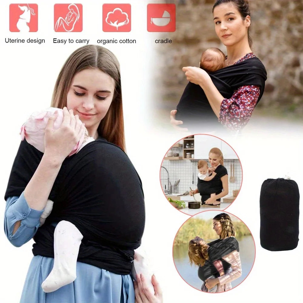 Porte-bébé en tissu léger noir porté mains libres en ventral